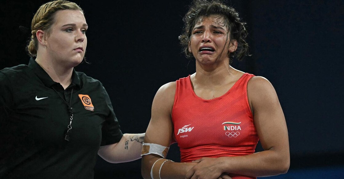 Nisha Dahiya is inconsolable after the bout. Photo: AFP/Punit Paranjpe