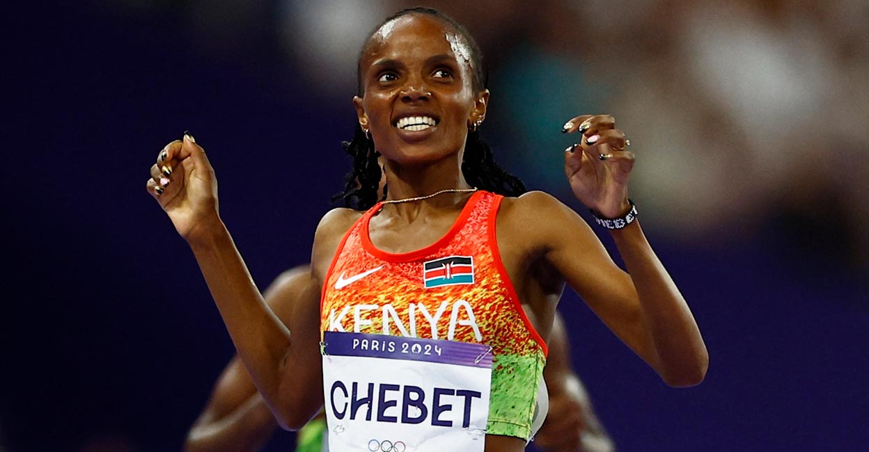 Beatrice Chebet of Kenya reacts as she crosses the line to win gold. Photo: Reuters/Sarah Meyssonnier