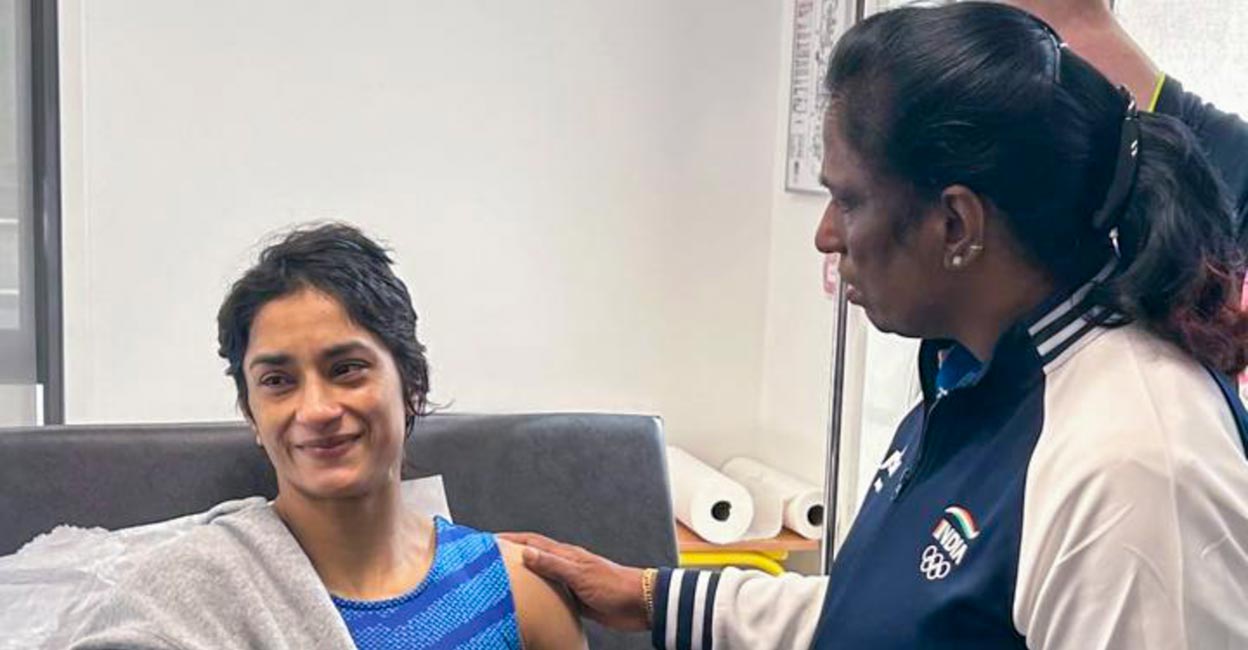 Usha meets Vinesh IOA president P T Usha meets Vinesh Phogat at the hospital. Photo: PTI