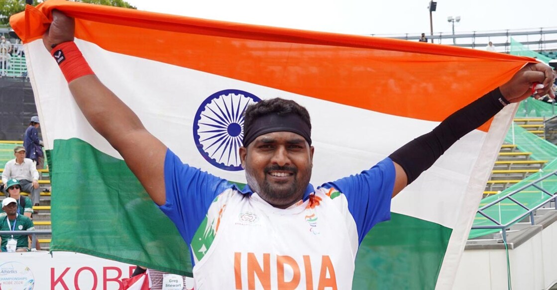  Sachin Sarjerao Khilari celebrates with the tricolour. Photo: X@ParalympicIndia via IANS