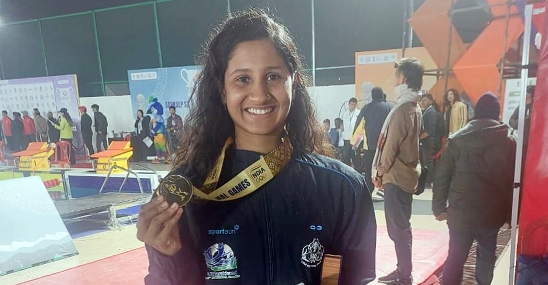 Harshitha Jayaram poses with the gold medal. Photo: KOA