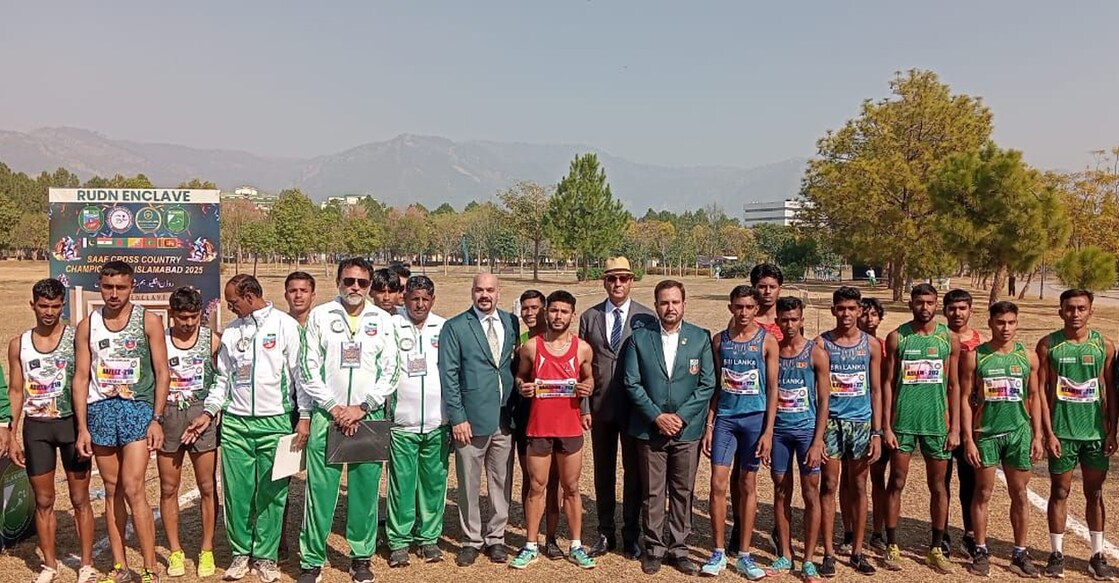 Athletes and officials line up before the South Asian Athletics Federation Cross-Country Championships at F-9 Park in Islamabad, Pakistan on Sunday. Photo: Facebook/Athletics Federation of Pakistan