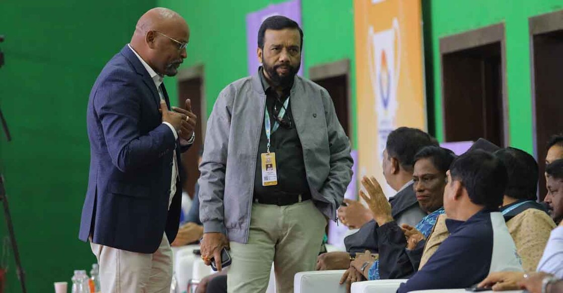 KOA-usha-main Kerala's Chef de Mission Sebastian Xavier and KOA President V Sunil Kumar interact with IOA President PT Usha at a National Games venue in Uttarakhand. Photo: Special arrangement