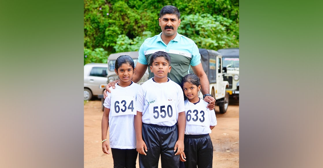 jitto-mathew-children-marathon Jitto Mathew with his children Asha Mol, Joel and Anugraha. Photo: Special arrangemnet