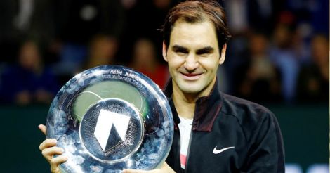 Federer swats aside Dimitrov to claim Rotterdam title