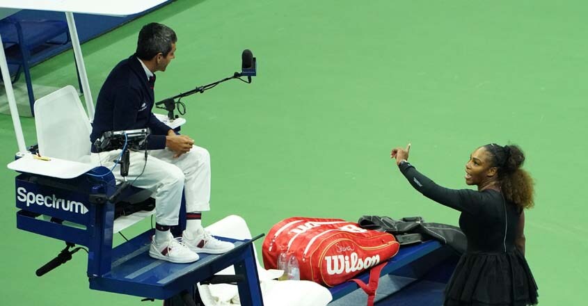 TENNIS-US-OPEN-2018 Serena Williams of the US argues with chair umpire Carlos Ramos while playing Naomi Osaka of Japan during their 2018 US Open women's singles final match on September 8, 2018 in New York.
Osaka, 20, triumphed 6-2, 6-4 in the match marred by Williams's second set outburst, the American enraged by umpire Carlos Ramos's warning for receiving coaching from her box. She tearfully accused him of being a "thief" and demanded an apology from the official.
/ AFP PHOTO / kena betancur