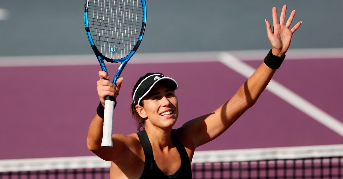 Garbine Muguruza celebrates her win. Photo: Reuters