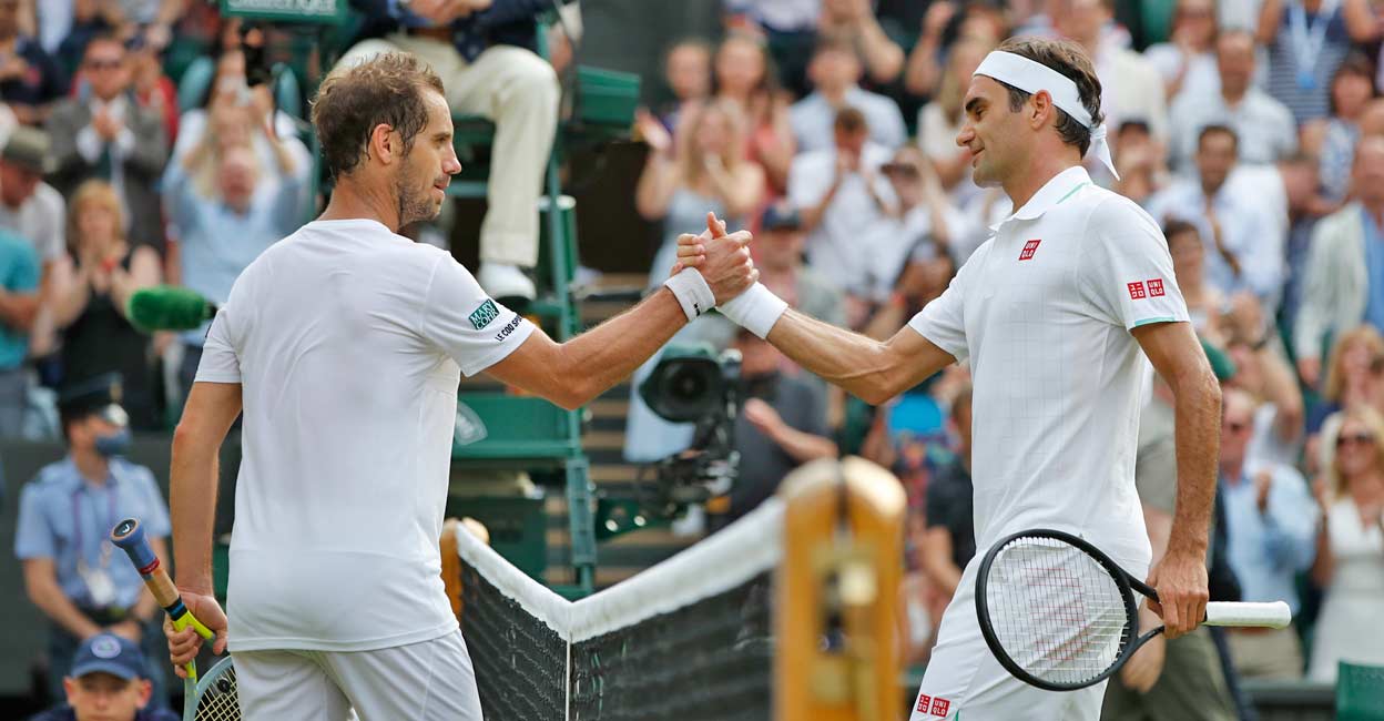 Roger Federer Switzerland's Roger Federer shakes hands with France's Richard Gasquet after winning their second round match. Reuters/Paul Childs