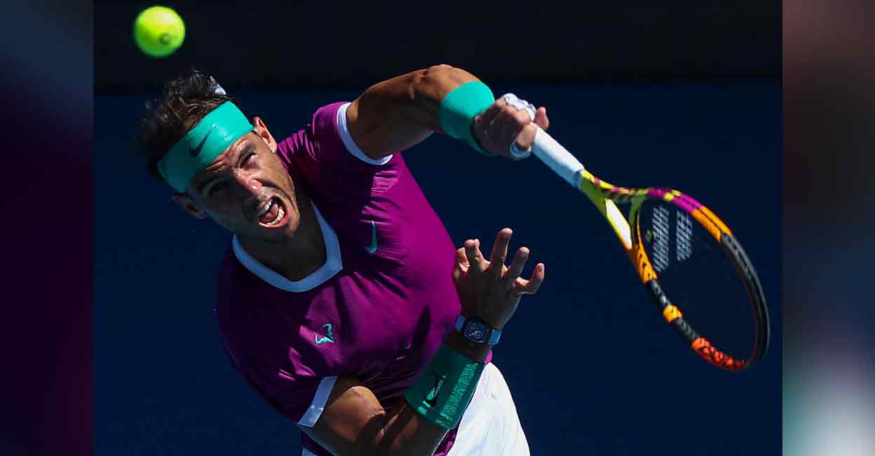 Spain's Rafael Nadal serves against France's Adrian Mannarino during their men's singles match on day seven of the Australian Open in Melbourne on Sunday. Photo: AFP
