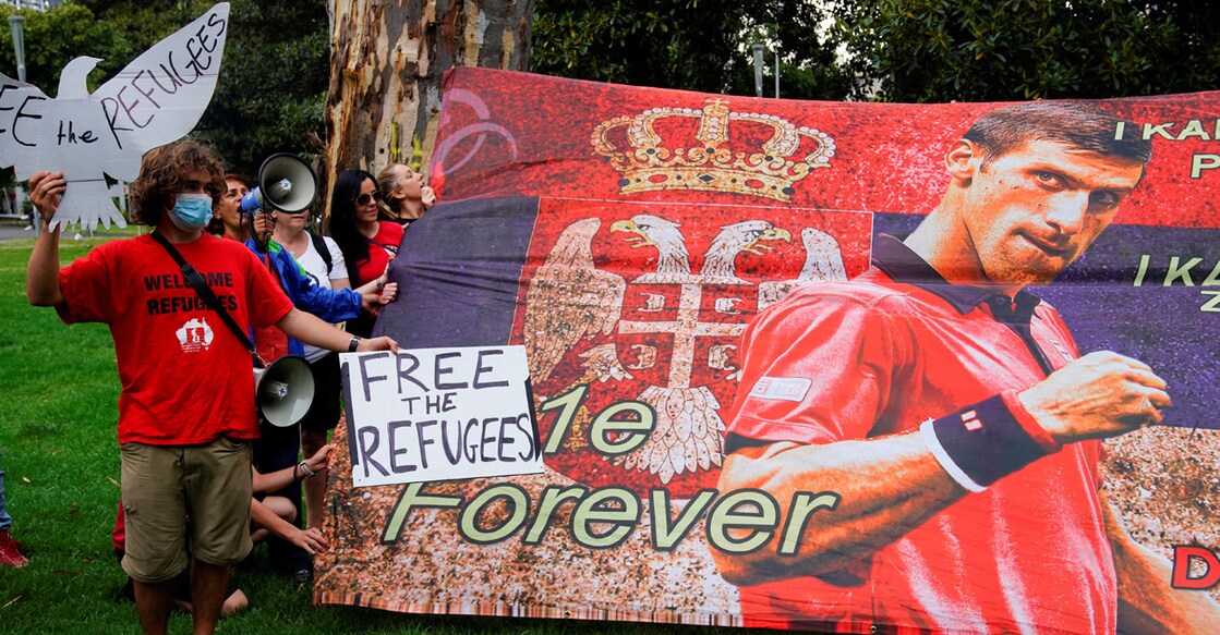 Novak Djokovic's supporters  and pro-refugee protestors rally outside the Park Hotel in Melbourne. Photo: Reuters/Sandra Sanders