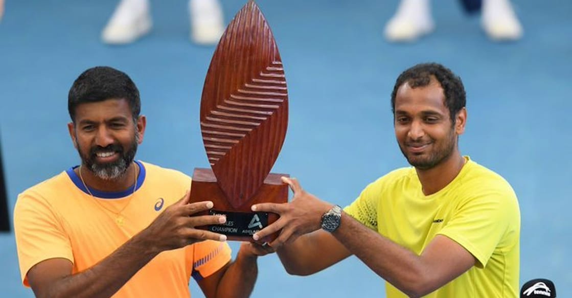  Rohan Bopanna and Ramkumar Ramanathan pose with the trophy. Photo: IANS