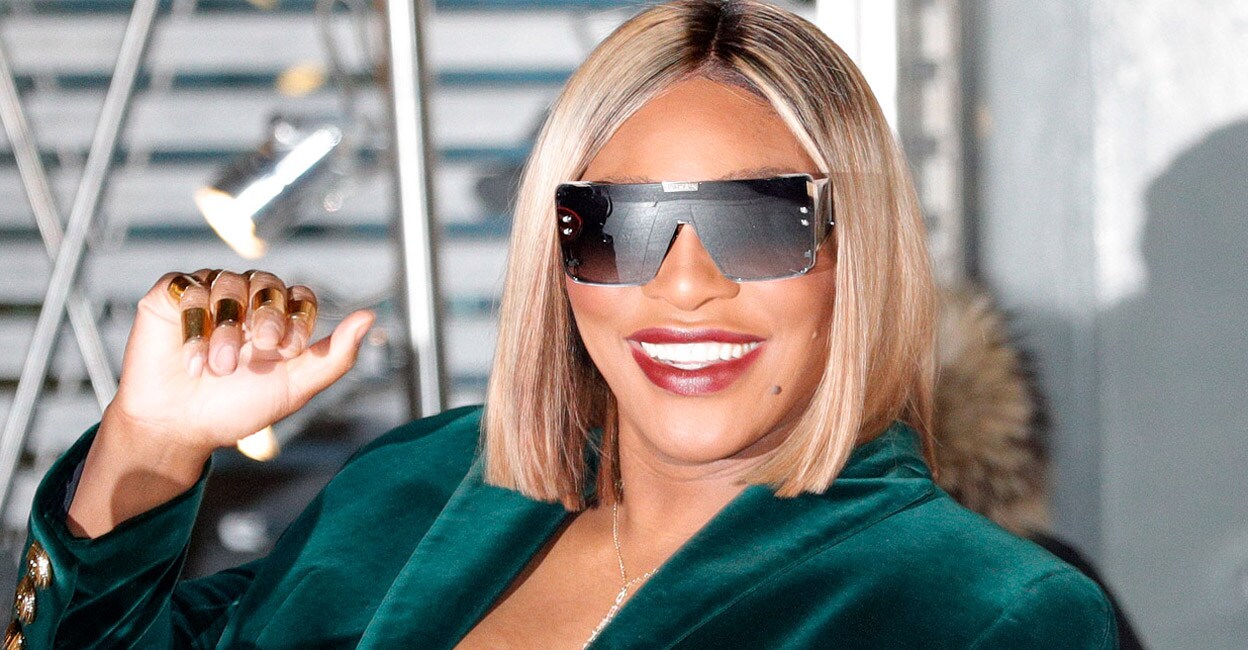 Serena Williams waves to fans as she arrives prior to the Balmain Fall-Winter 2022-2023 collection fashion show in Paris on Wednesday. File photo: AFP/Stefano Rellandini