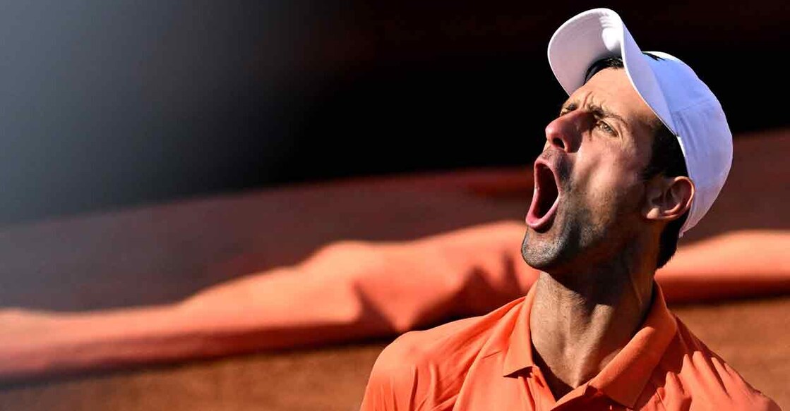 Serbia's Novak Djokovic celebrates winning a game during the final match of the Men's ATP Rome Open tennis tournament against Greece's Stefanos Tsitsipas at Foro Italico in Rome on Sunday. Photo: AFP/ Tiziana Fabi