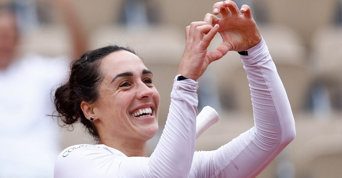 Martina Trevisan celebrates winning her fourth round match against Aliaksandra Sasnovich. Photo: Reuters/Yves Herman
