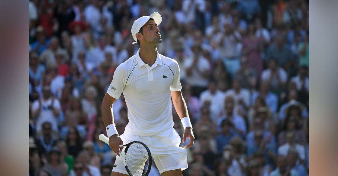 Serbia's Novak Djokovic celebrates winning his semifinal match against Britain's Cameron Norrie. Photo: Reuters/ Toby Melville