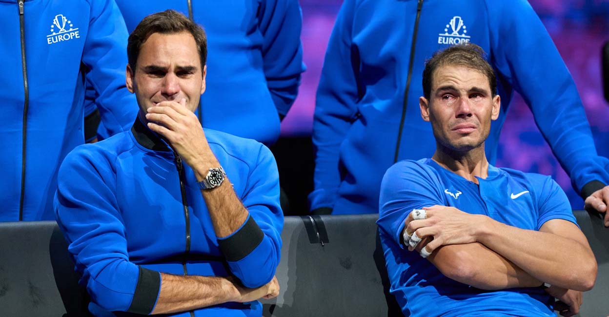 TENNIS Sep 23, 2022; London, United Kingdom; A tearful Roger Federer (SUI) and Rafael Nadal (ESP) look on after his last Laver Cup Tennis match. Mandatory Credit: Peter van den Berg-USA TODAY Sports