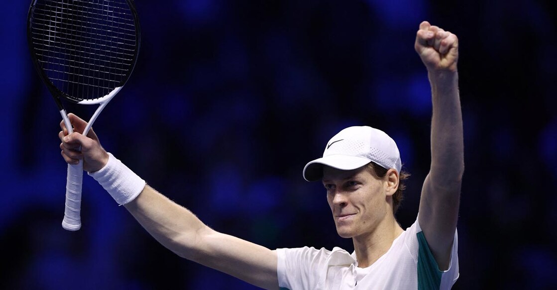 Jannik Sinner celebrates after beating Novak Djokovic. Photo: Reuters//Guglielmo Mangiapane
