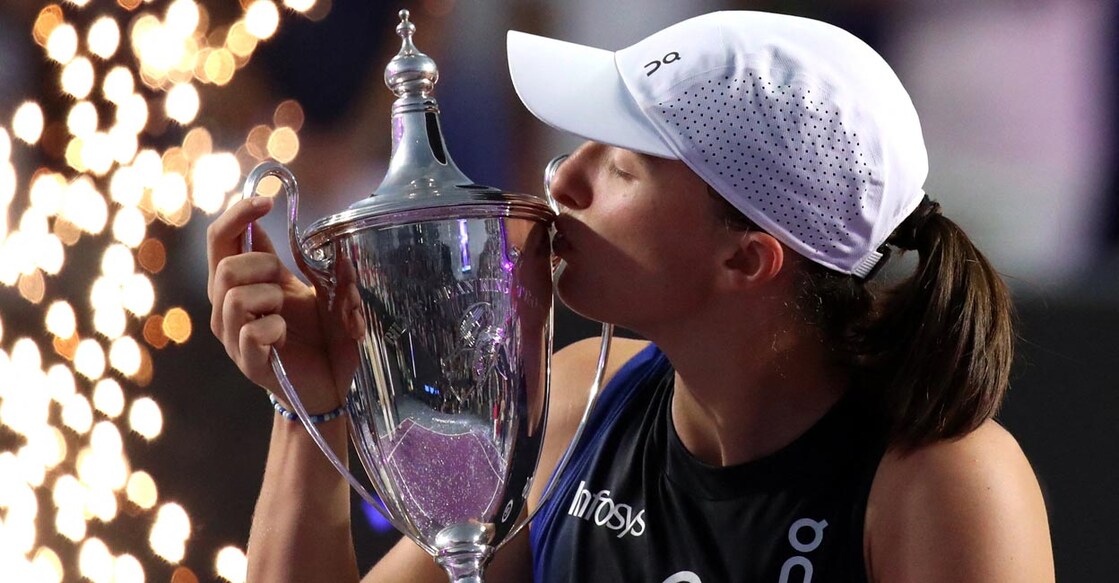 Poland's Iga Swiatek celebrates with the trophy. Photo: Reuters/Henry Romero