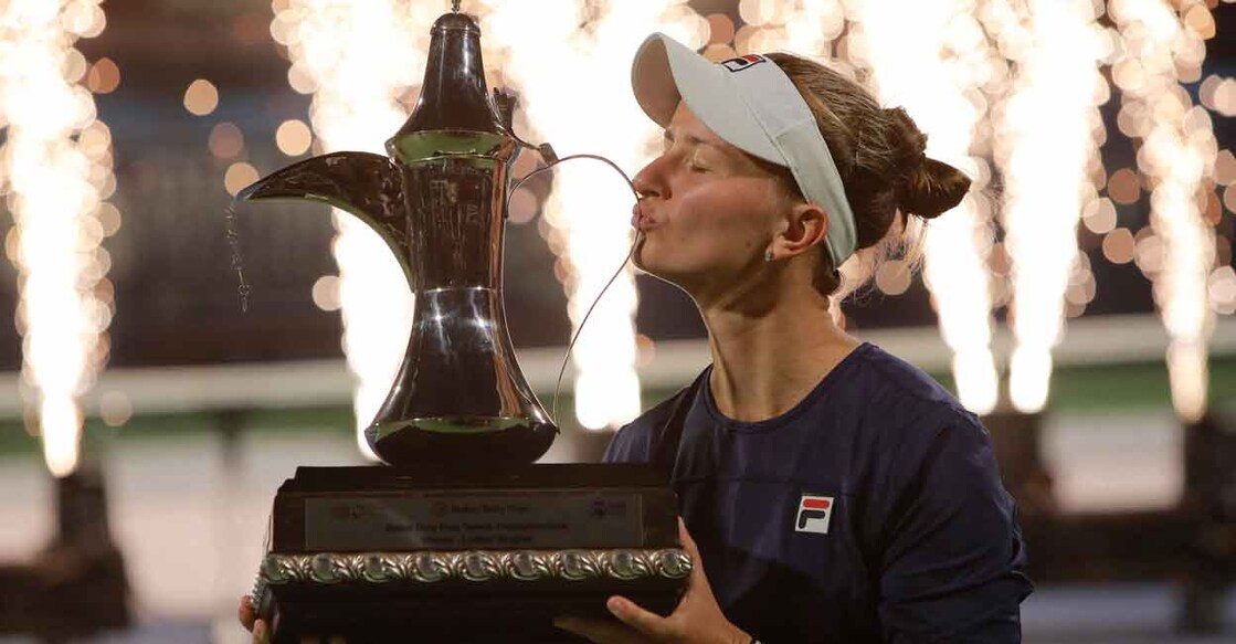 Barbora Krejcikova celebrates with the trophy after winning the final against Iga Swiatek. Photo: Reuters/Amr Alfiky