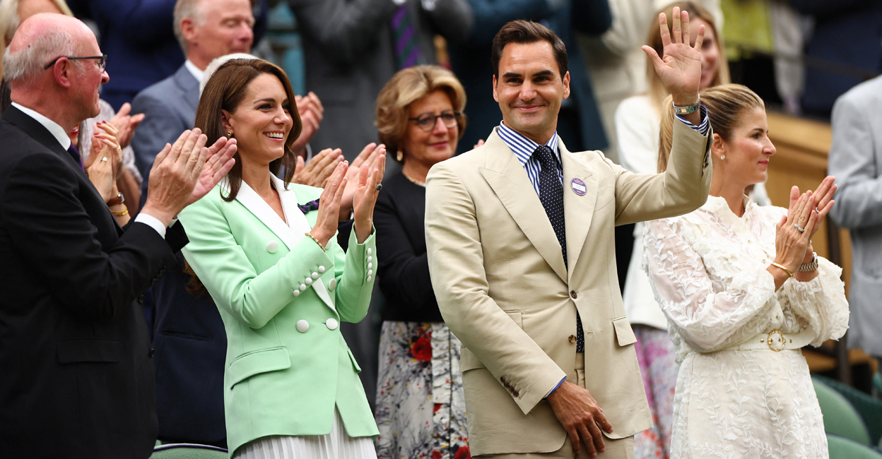 Eight-time Wimbledon champion Roger Federer stands alongside Catherine, Princess of Wales during a presentation on centre court to honour his achievements. Photo: Reuters/Toby Melville