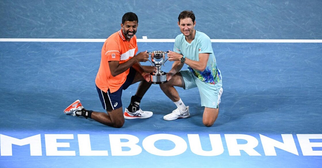 Rohan Bopanna and Matthew Ebden pose with the trophy. Photo: AFP/William West