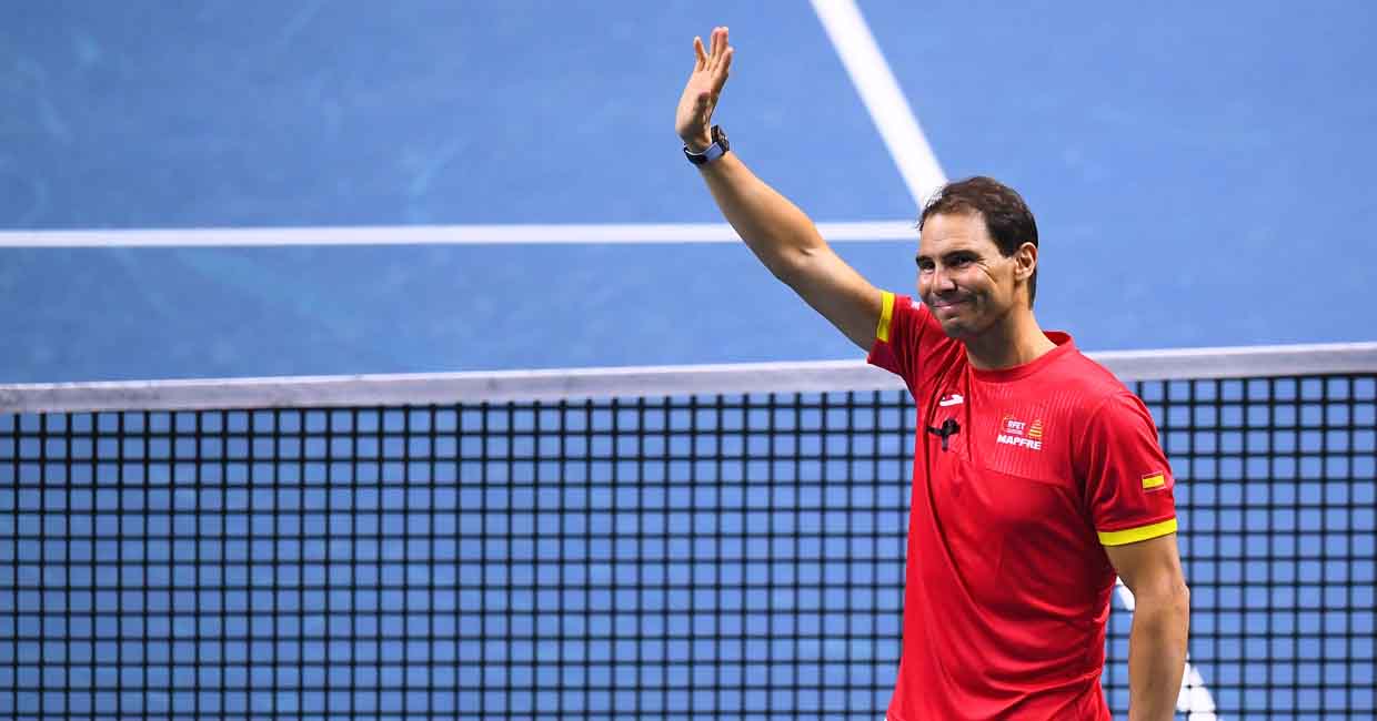 Spain's Rafael Nadal waves during a tribute to his career at the end of the quarter-final doubles match between Netherlands and Spain during the Davis Cup Finals at the Palacio de Deportes Jose Maria Martin Carpena arena in Malaga, southern Spain, on November 19, 2024. - Superstar Rafael Nadal's glittering career in professional tennis came to an end on November 19, 2024 as Netherlands eliminated Spain in the Davis Cup quarter-finals. (Photo by JORGE GUERRERO / AFP)
