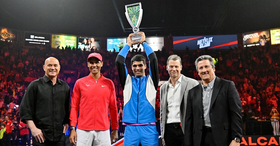 Netflix Slam From left: Andre Agassi, Rafael Nadal, Carlos Alcaraz, Greg Peters and William Hornbuckle at the presentation ceremony in Las Vegas. Photo: AFP/David Becker