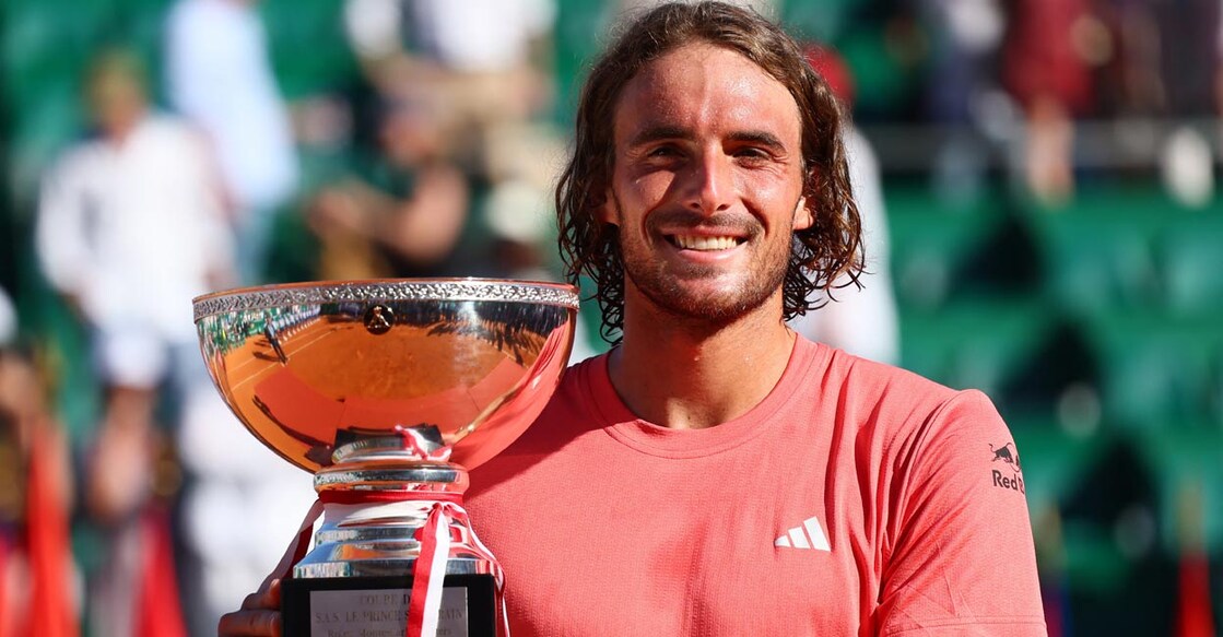 Stefanos Tsitsipas poses with the trophy. Photo: Reuters/Denis Balibouse