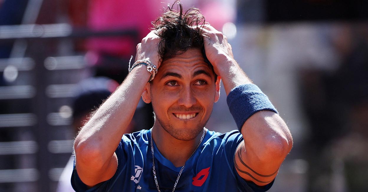 Alejandro Tabilo celebrates his upset win over Novak Djokovic. Photo: Reuters/Claudia Greco