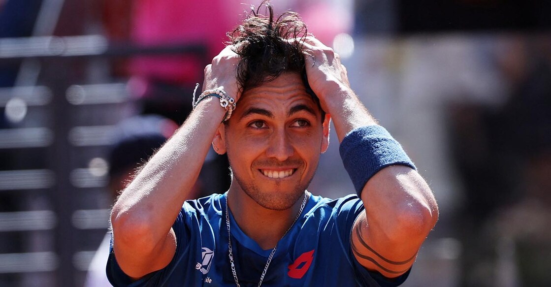 Alejandro Tabilo celebrates his upset win over Novak Djokovic. Photo: Reuters/Claudia Greco