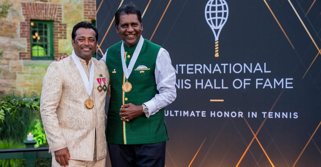 Leander Paes and Vijay Amritraj pose for photos following the International Tennis Hall of Fame Induction Ceremony in Newport, Rhode Island. Photo: AFP/Joe Buglewicz