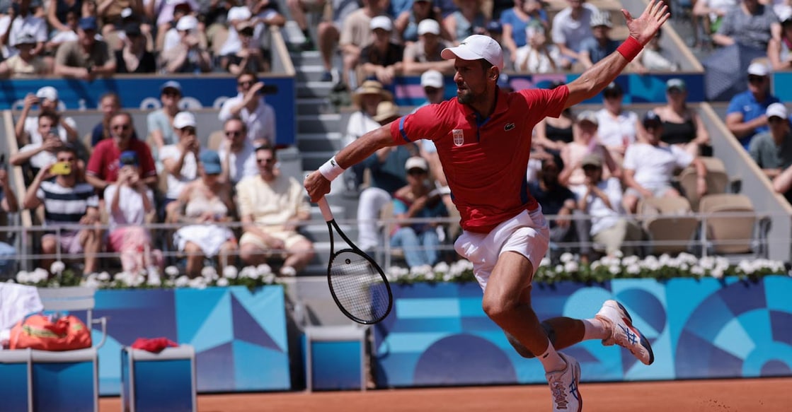 Novak Djokovic action against Dominik Koepfer. Photo: Reuters/Claudia Greco