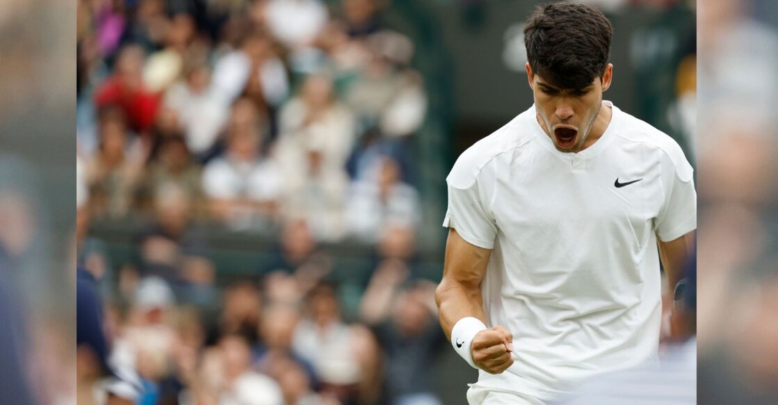 Carlos Alcaraz reacts after winning a point against Aleksandar Vukic in Wimbledon second round on Wednesday. Photo: USA Today Sports via Reuters/Geoff Burke