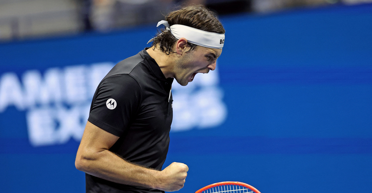 USA's Taylor Fritz celebrates winning the fourth set in the men's semifinals match against USA's Frances Tiafoe on day twelve of the US Open tennis tournament. Photo: Charly Triballeau/AFP
