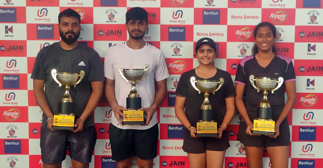 tennis-doubles-winners Men's and women's doubles champions pose with the trophies. Photo: Special arrangement