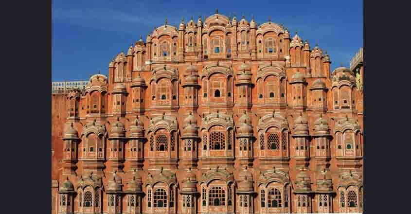 INDIA-JAIPUR-ARCHITECTURE-HAWA MAHAL The facade of the Hawa Mahal or "Palace of Winds" in the old walled city of Jaipur on November 14, 2011. The iconic building was designed to allow veiled ladies of the time to see the street scenes below without being seen. The baroque style building was built in 1799 by the Rajasthany royalty. Jaipur is know as the "Pink City" because its prominent buildings are washed in hue of pink. AFP PHOTO/Roberto Schmidt