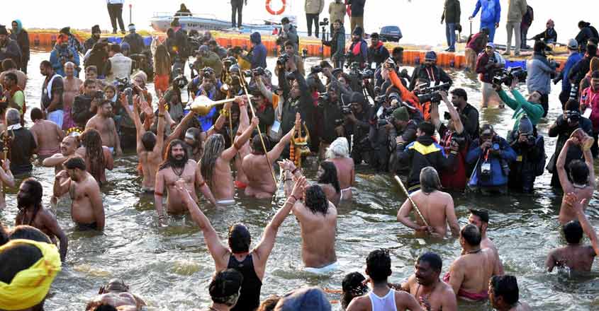 Prayagraj: Ascetics take a holy dip at Sangam -- the confluence of rivers Ganga, Yamuna and the mythical Saraswati -- to mark the onset of the Kumbh Mela on the auspicious day of Makar Sankranti in Prayagraj, on Jan 15, 2019. (Photo: IANS) Prayagraj: Ascetics take a holy dip at Sangam -- the confluence of rivers Ganga, Yamuna and the mythical Saraswati -- to mark the onset of the Kumbh Mela on the auspicious day of Makar Sankranti in Prayagraj, on Jan 15, 2019. (Photo: IANS)