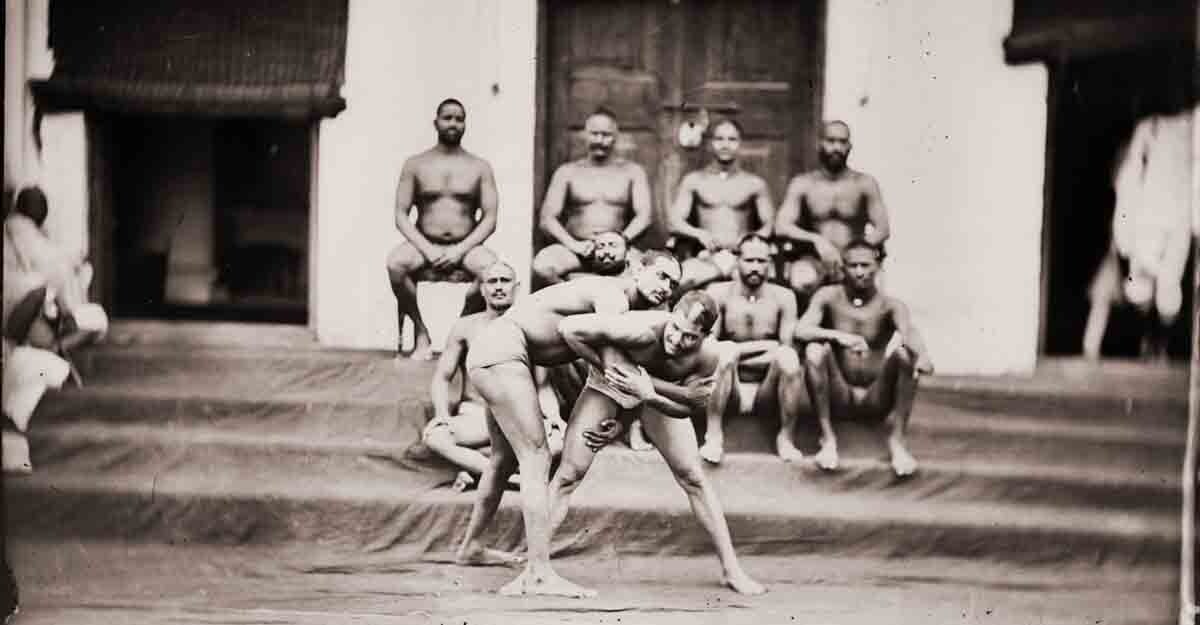 Maharaja Sawai Ram Singh II, Wrestlers in an akhara, Modern digital reprint from wet collodion glass plate negative, c. 1870 CE. Maharaja Sawai Ram Singh II, Wrestlers in an akhara, Modern digital reprint from wet collodion glass plate negative, c. 1870 CE.