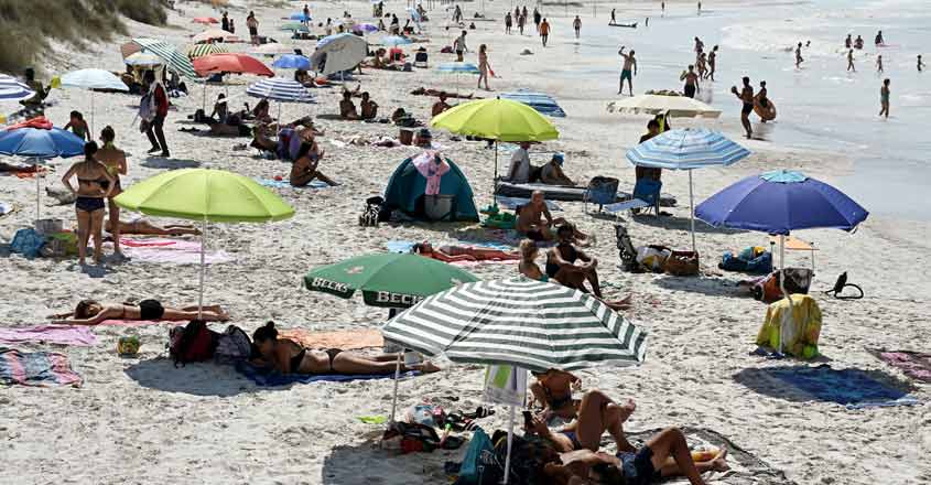 Lovers of Tuscany's 'paradise' beach have factory to thank Lovers of Tuscany's 'paradise' beach have factory to thank