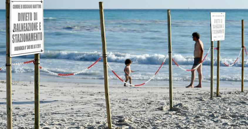 Lovers of Tuscany's 'paradise' beach have factory to thank Lovers of Tuscany's 'paradise' beach have factory to thank