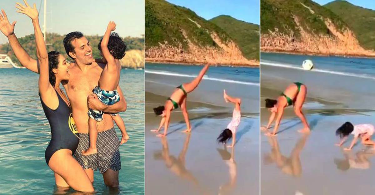 Lisa has a great time with son on Hong Kong beach