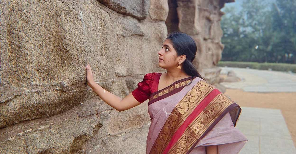 The actress is seen enjoying the marvel of architecture at the destination in a wide-bordered traditional cotton saree. Photo: Instagram @nimisha_sajayan