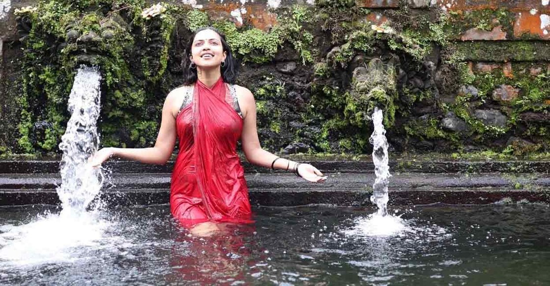 Amala also posted photos of her taking in a dip in a pond at Pura Gunung Kawi Sebatu on the Shiavratri day as part of a purification ritual. Photo: Instagram @amalapaul