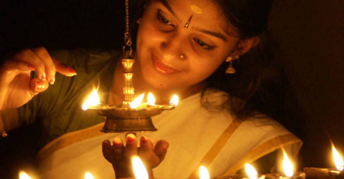 Lighting the lamps is an integral part of the festivities. Photo: Onmanorama