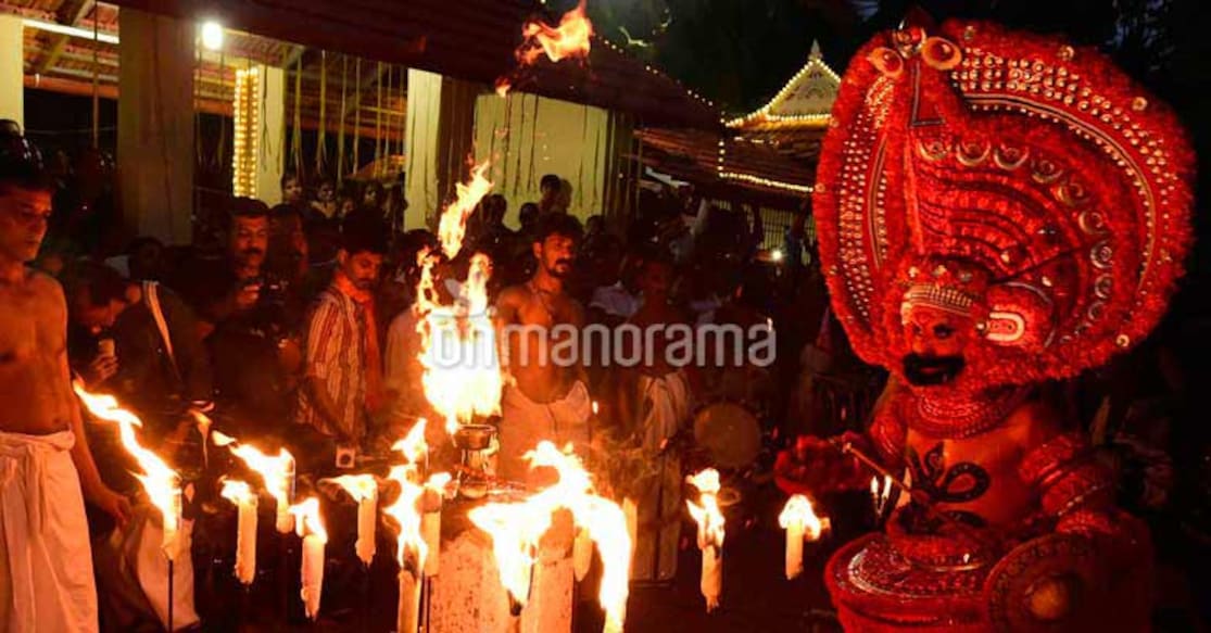 For ethereal nights, walk with the Theyyams of Kannur. Photo: Onmanorama
