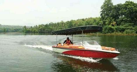 bhoothathankettu-roy-on-boat bhoothathankettu-roy-on-boat
