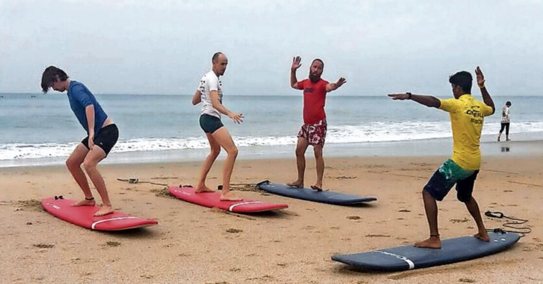 Surfing in Varkala beach