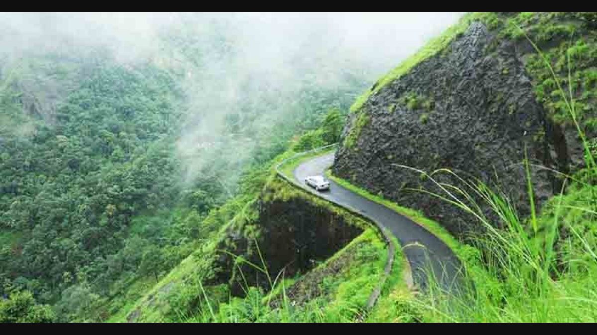 Lush green peak of mountain above foggy valley at Gavi dam Munnar Idukki  Kerala India. major Indian tourist attraction spot. Top view of river Stock  Photo - Alamy