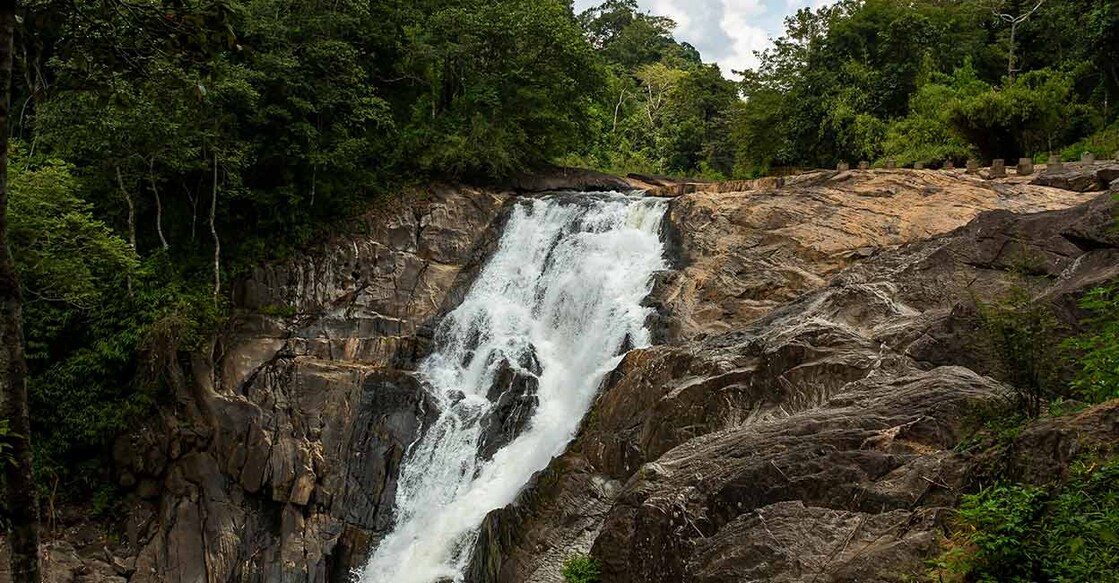 The awe-inspiring Meenmutty waterfall is situated near Kattukunnu and the Banasura mountains. Photo: Shutterstock/Chaithanya Krishnan