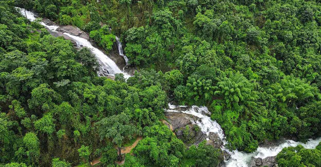 The Thusharagiri waterfalls is at the Chalipuzha River which is a tributary of Iruvazhinji River that originates in Vellarimala mountains. Photo: Shutterstock/Raahims